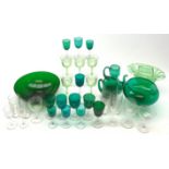 A quantity of various green glassware, to include a large bowl, large glass on knopped stem, and var