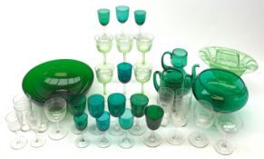 A quantity of various green glassware, to include a large bowl, large glass on knopped stem, and var
