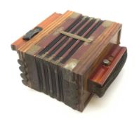 Early 20th century German ten-button accordion with simulated wood grain finish, the metal mounts w