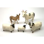 A Beswick Billy Goat, together with a Beswick Donkey, and Beswick Ram, Ewe, and Lamb, each with prin