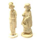 Two Japanese carved ivory okimons, each modelled as a geisha, each approximately H15cm.