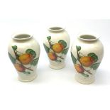 Three Portmeirion vases, of baluster form decorated with Roman Apricots, each with mark beneath, H25