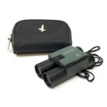 A pair of Swarovski Habicht 10 x 25B pocket binoculars, with maker's case.