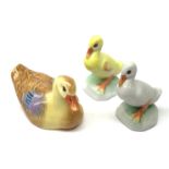A Herend porcelain model of a Duck, together with two Herend Ducklings, each with printed mark benea