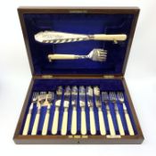 A mahogany cased Walker & Hall set of six fish knives and forks, and pair of fish servers, with engr