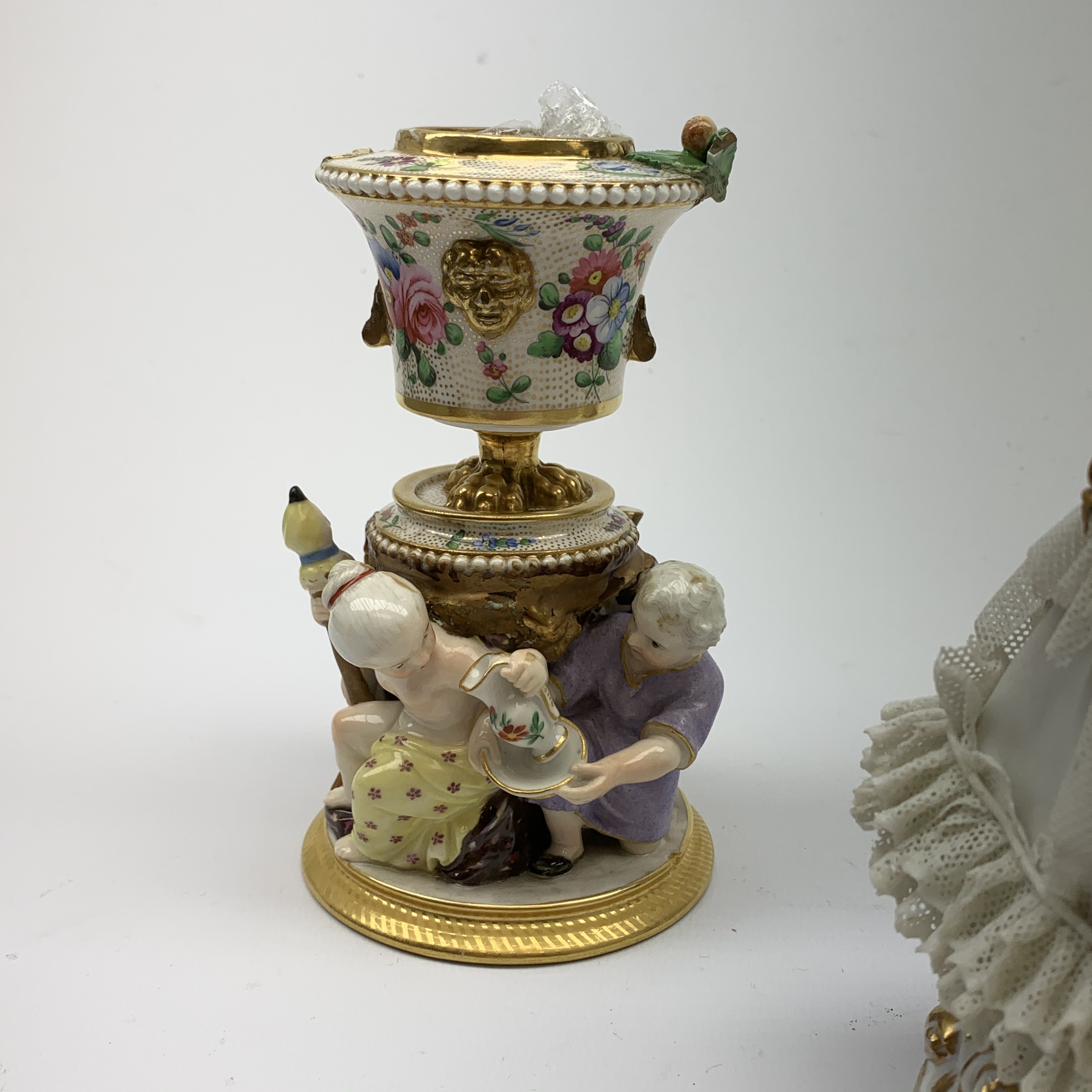 A 20th century Sitzendorf porcelain figurine, modelled in lace dress detailed with gilt flowers and - Image 2 of 8