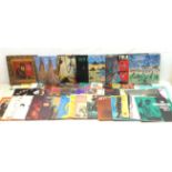 A group of various Vinyl records, to include examples by Janis Joplin, Jimi Hendrix, Talking Heads,