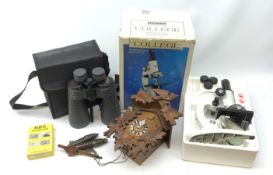 A boxed Konus College microscope, with a small selection of slides, together with cased pair of Suna