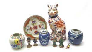 A group of Oriental ceramics, comprising two blue and white prunus pattern ginger jars, each with do