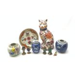 A group of Oriental ceramics, comprising two blue and white prunus pattern ginger jars, each with do