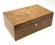 A late 19th century walnut writing slope, with inlaid borders and central mother of pearl plaque to