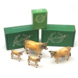 A Beswick Jersey Bull, Jersey Cow, and two Jersey Calfs, three with maker's boxes, each with printed