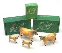 A Beswick Jersey Bull, Jersey Cow, and two Jersey Calfs, three with maker's boxes, each with printed