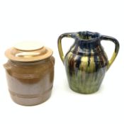 A large drip glaze stoneware twin handled vessel, of ovoid form with a merging blue, brown and green