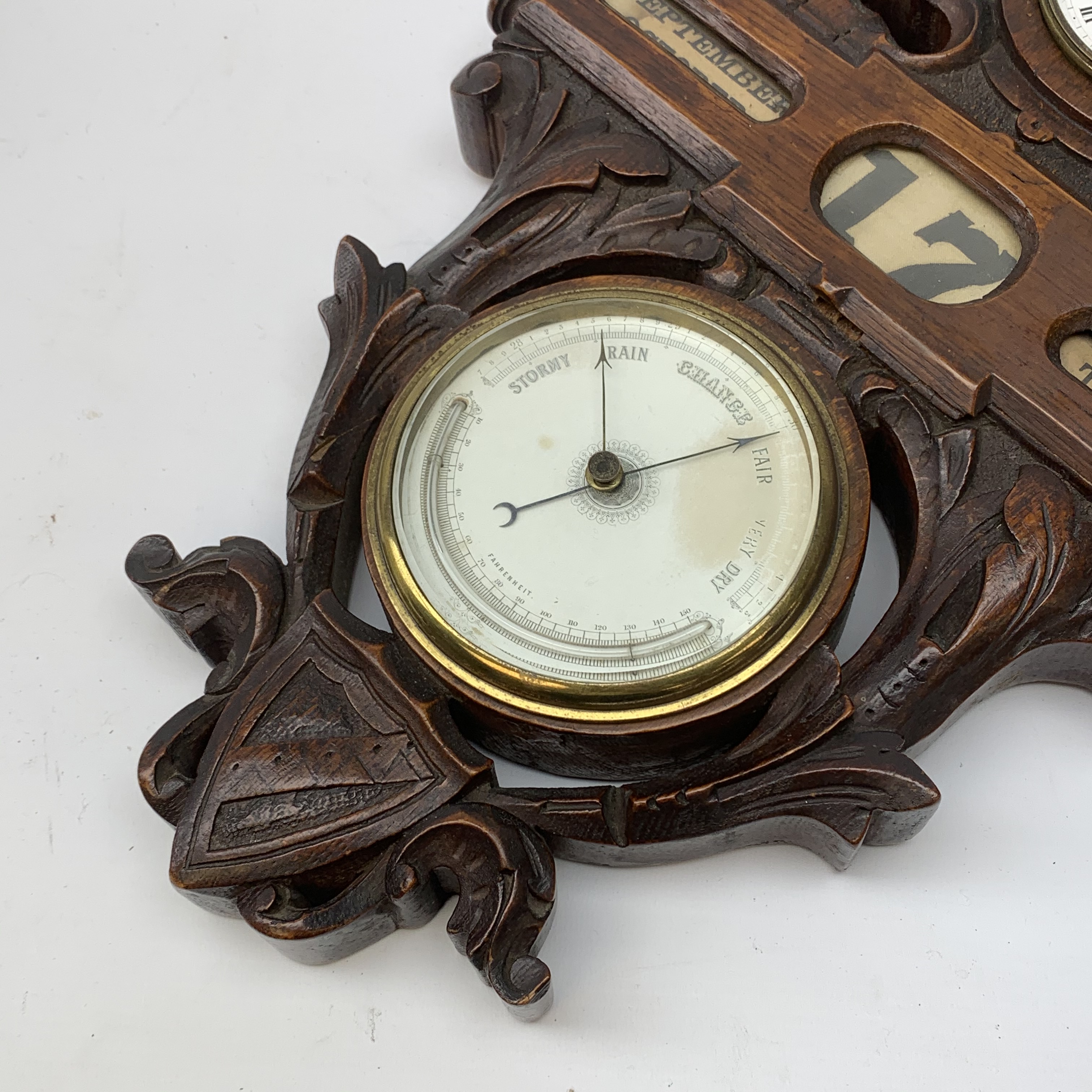 A late 19th century oak wall hanging combination clock, barometer and perpetual calendar, the 8.5cm - Image 2 of 3