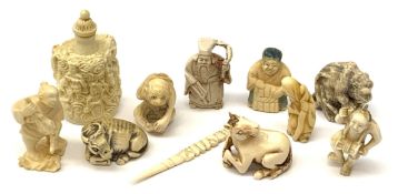 A group of various ivorine items, mostly netsukes modelled in various forms, to include sages, tiger
