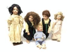 A group of five reproduction bisque head dolls, one example marked K&R to neck (Kammer and Reinhardt