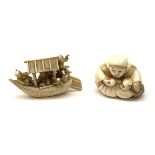 A Japanese carved ivory Netsuke, modelled as a seated figure with monkey companion, signed beneath,