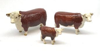 A Beswick Hereford Bull, Hereford Cow, and Hereford Calf, each with printed mark beneath, Bull and C