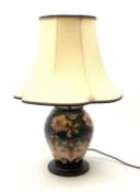 A Moorcroft Oberon pattern lamp, designed by Rachel Bishop, of baluster form and raised upon a circu