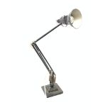 A black Hebert Terry Anglepoise lamp, on square stepped base, marked.