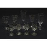 A group of nine Edwardian drinking glasses, a number with etched decoration, largest H15cm.