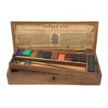 A Victorian mahogany artists paint box by Charles, Roberson & Co, the lid stamped 'Department of Sci