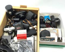 Collection of cameras and accessories comprising a Canon Canonet with a SE 45mm Canon Lens, Olympu