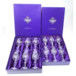 A boxed set of six Edinburgh Crystal wine glasses, together with a further boxed set of smaller Edin