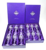 A boxed set of six Edinburgh Crystal wine glasses, together with a further boxed set of smaller Edin