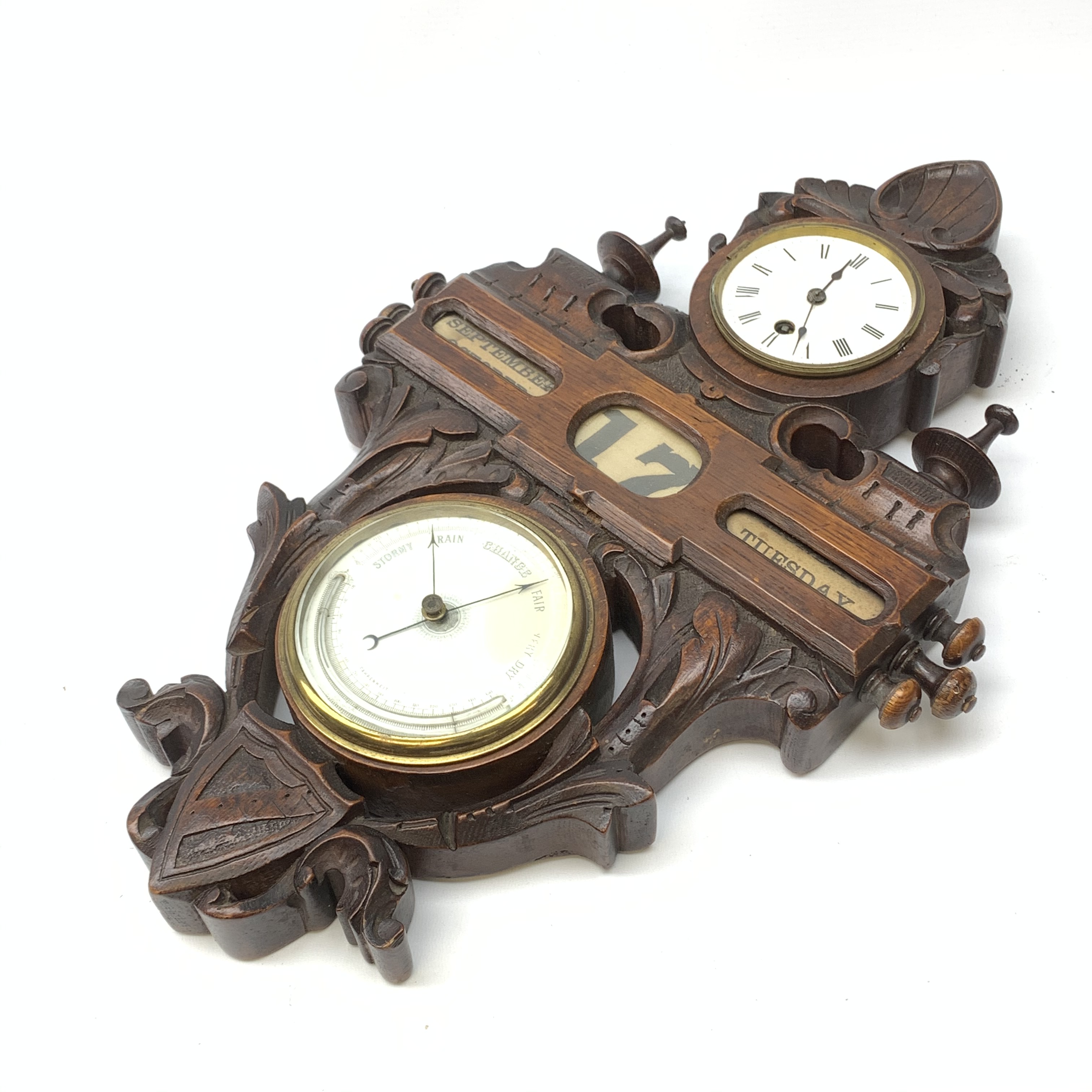 A late 19th century oak wall hanging combination clock, barometer and perpetual calendar, the 8.5cm