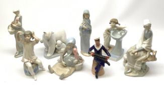 A mid 20th century Dresden porcelain figurine, modelled as a sailor playing an accordion, H16.5cm, t