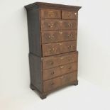19th century walnut chest on chest, projecting cornice, two short and six graduating drawers, shaped