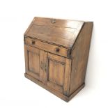 19th century stained pine bureau, fall front enclosing fitted interior, single drawer above two cupb