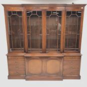 Wade Georgian style mahogany breakfront bookcase display cabinet, projecting cornice, dentil frieze,