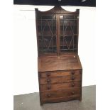 19th century mahogany bureau bookcase, two doors enclosing three shelves above fall front with fitte