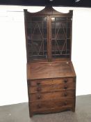 19th century mahogany bureau bookcase, two doors enclosing three shelves above fall front with fitte