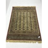 Bokhara beige and pink ground rug, repeating border, geometric patterned field (167cm x 124cm) and a