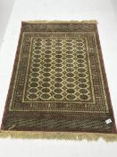 Bokhara beige and pink ground rug, repeating border, geometric patterned field (167cm x 124cm) and a