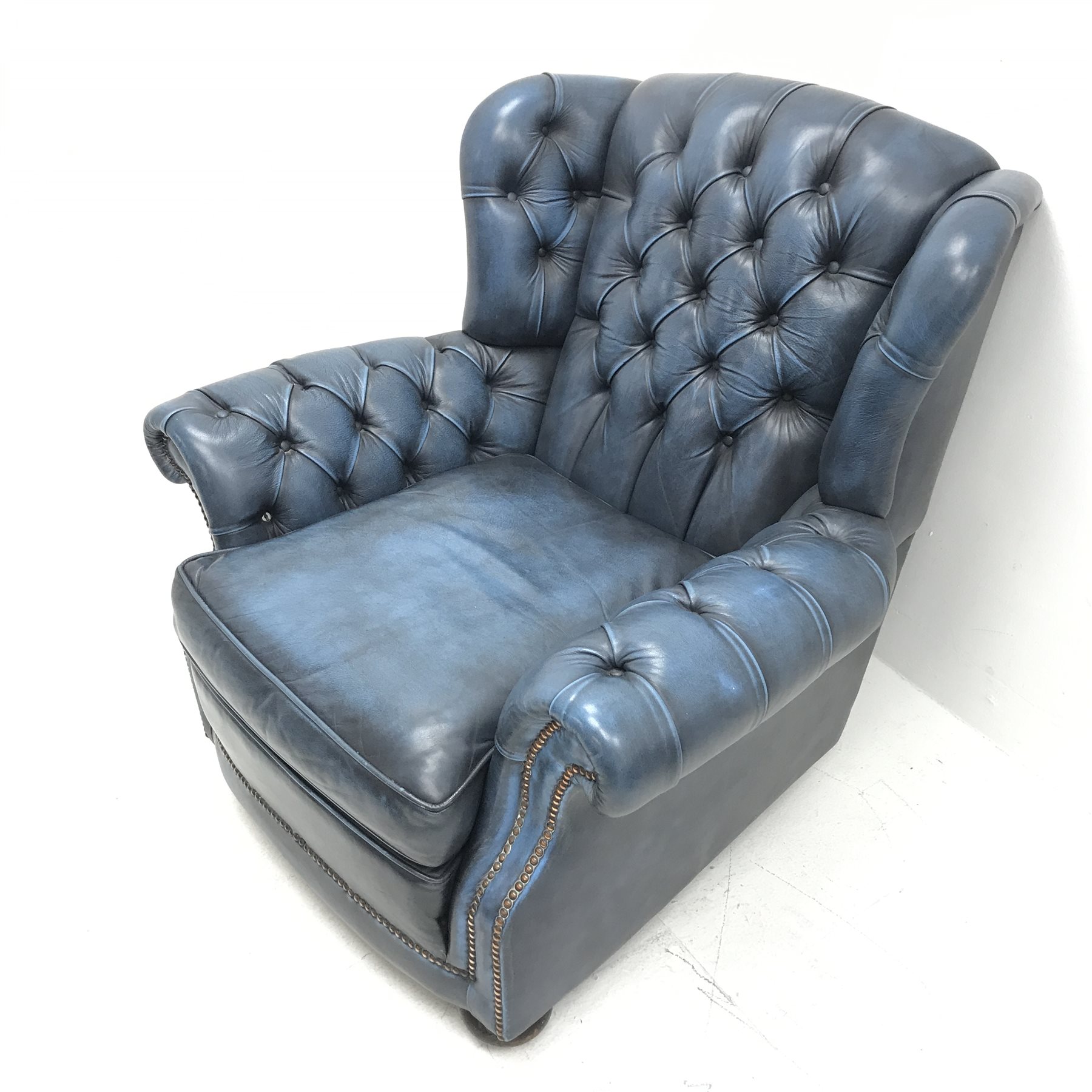 Georgian style wingback armchair upholstered in a deep buttoned blue leather, W91cm - Image 2 of 3
