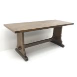 20th century oak refectory table, shaped solid end supports joined by single undertier, sledge feet,