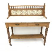 Edwardian walnut washstand, raised tiled back, marble top, turned supports joined by single undertie
