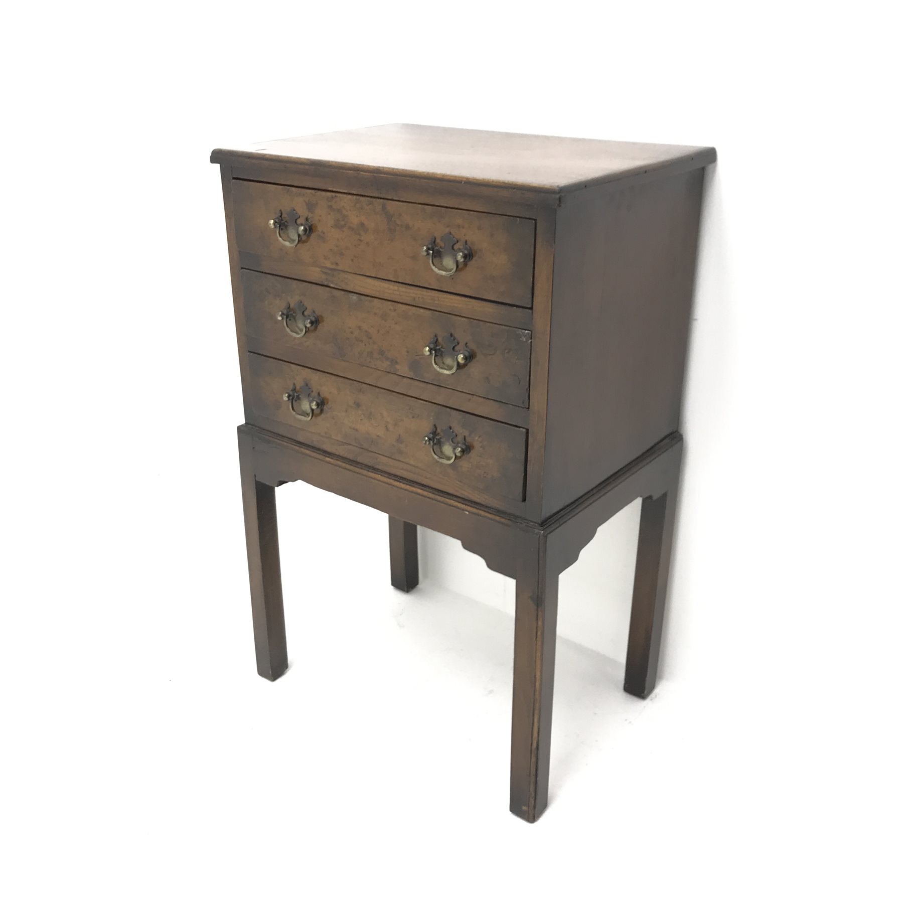Small early 20th century mahogany chest on stand, three walnut burr veneered drawers, square suppor