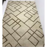 Modern beige ground rug, geometric patterned field, 290cm x 200cm