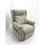 Electric reclining armchair upholstered in an ecru coloured fabric, W87cm