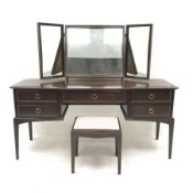 Stag mahogany dressing table, raised three piece mirror back, five drawers, square tapering supports