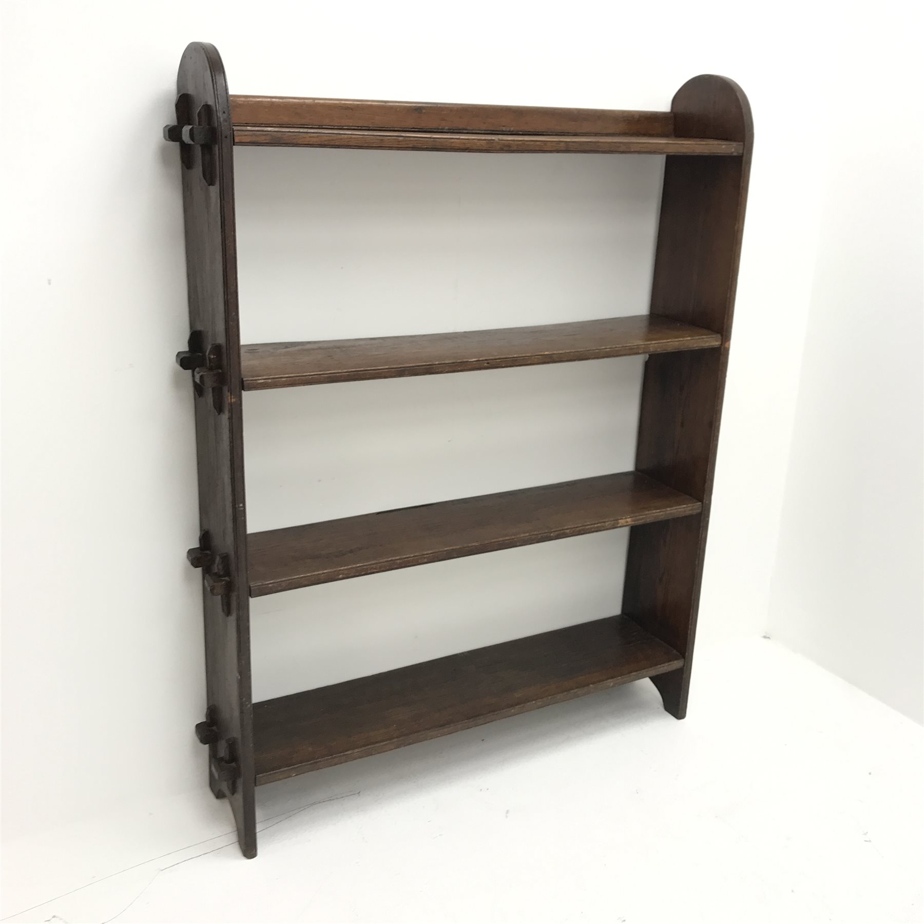 Early 20th century oak open bookcase, four pegged shelves, W104cm, H131cm, D23cm