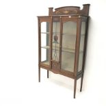 Edwardian inlaid mahogany display cabinet, raised shaped back, two doors flanking central leaded col
