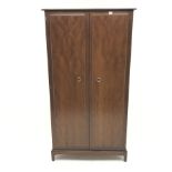 Stag mahogany double wardrobe, two doors enclosing fitted interior, shaped plinth base, W97cm, H178c