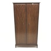 Stag mahogany double wardrobe, two doors enclosing fitted interior, shaped plinth base, W97cm, H178c